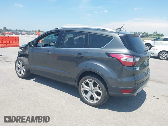 2018 Ford Escape Titanium with VIN 1FMCU9J99JUD43804, listed as a IAAI auction lot 41101250 with 56,438 mi miles and . Bid and sale history available at DreamBid. Image 3.