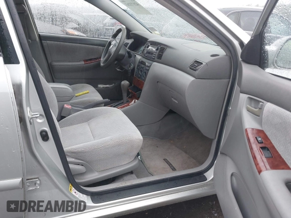2004 Toyota Corolla CE with VIN JTDBR38E642035944, listed as a IAAI auction lot 42173263 with 119,302 mi miles. Bid and sale history available at carsss.com. Image 5.
