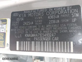 2014 Kia Optima LX with VIN KNAGM4A71E5493247, listed as a IAAI auction lot 42035797 with 153,811 mi miles. Bid and sale history available at carsss.com. Image 9.