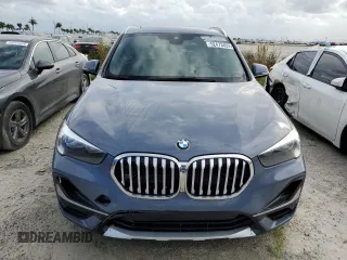 2021 BMW X1 sDrive28i z VIN WBXJG7C03M5T49590, wystawiony jako Copart lot #52473453 z przebiegiem 19 199 mil mil oraz Nie do naprawy. Historia ofert i sprzedaży dostępna na DreamBid. Obrazek 5.