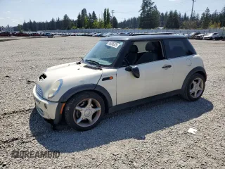 2006 MINI Hardtop z VIN WMWRC33586TJ77908, wystawiony jako Copart lot #55095525 z przebiegiem 143 810 mil mil oraz Szkoda całkowita • Salvage title. Historia ofert i sprzedaży dostępna na DreamBid. Obrazek 1.
