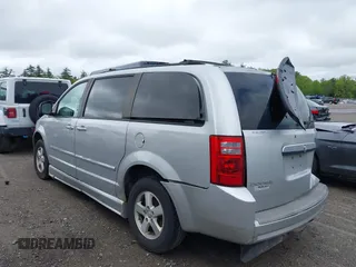 2009 Dodge Grand Caravan SXT z VIN 2D8HN54139R615585, wystawiony jako IAAI lot #42334638 z przebiegiem 129 672 mil mil oraz . Historia ofert i sprzedaży dostępna na DreamBid. Obrazek 3.