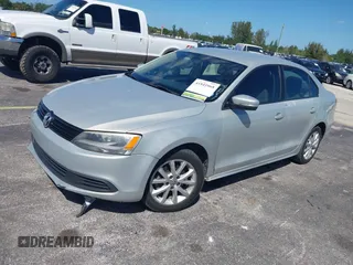 2011 Volkswagen Jetta SE with VIN 3VWDX7AJ4BM330363, listed as a IAAI auction lot 41841068 with 154,676 mi miles and . Bid and sale history available at DreamBid. Image 2.