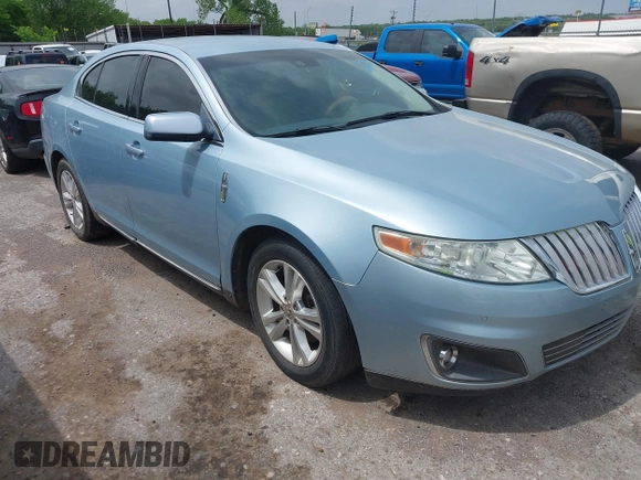 2009 Lincoln MKS z VIN 1LNHM94R89G600463, wystawiony jako IAAI lot #42138845 z przebiegiem Nie podano mil oraz . Historia ofert i sprzedaży dostępna na DreamBid. Obrazek 1.