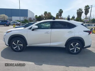 2021 Lexus NX 300h with VIN JTJGJRDZ2M5012553, listed as a IAAI auction lot 41850243 with 56,737 mi miles and . Bid and sale history available at DreamBid. Image 14.