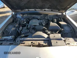 1991 Mercury Grand Marquis z VIN 2MECM74F4MX647208, wystawiony jako Copart lot #48439705 z przebiegiem 99 952 mil mil oraz Tytuł czysty. Historia ofert i sprzedaży dostępna na DreamBid. Obrazek 11.