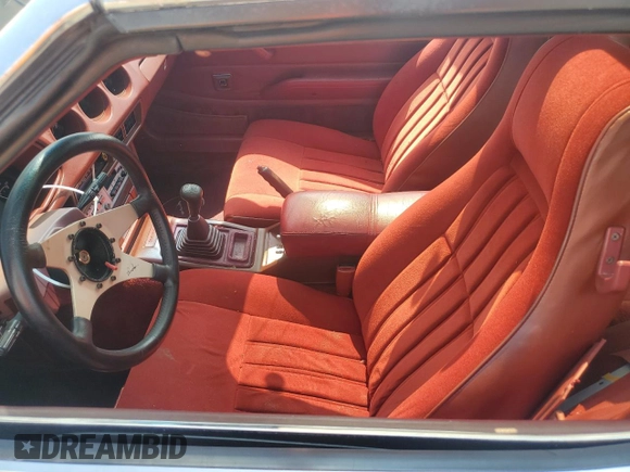 1981 Datsun 280ZX z VIN JN1HZ04S5BX279396, wystawiony jako Copart lot #60198965 z przebiegiem 85 526 mil mil oraz Szkoda całkowita • Salvage title. Historia ofert i sprzedaży dostępna na DreamBid. Obrazek 7.
