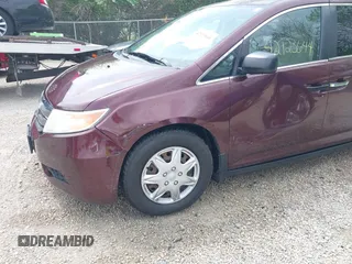 2013 Honda Odyssey LX with VIN 5FNRL5H25DB080209, listed as a IAAI auction lot 42123644 with 157,631 mi miles and . Bid and sale history available at carsss.com. Image 6.