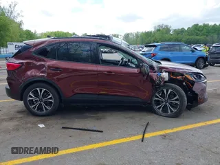 2021 Ford Escape SE Hybrid with VIN 1FMCU9BZ9MUA15592, listed as a IAAI auction lot 42261312 with 56,525 mi miles and . Bid and sale history available at DreamBid. Image 13.