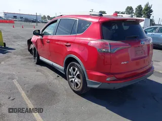 2017 Toyota RAV4 LE z VIN 2T3ZFREV2HW317056, wystawiony jako IAAI lot #41692139 z przebiegiem 66 102 mil mil oraz . Historia ofert i sprzedaży dostępna na DreamBid. Obrazek 3.