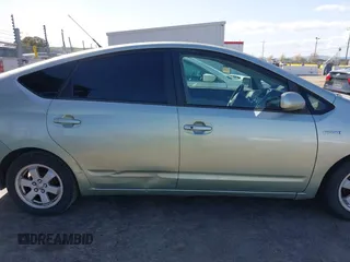 2007 Toyota Prius z VIN JTDKB20U877556527, wystawiony jako IAAI lot #41965245 z przebiegiem 259 572 mil mil oraz . Historia ofert i sprzedaży dostępna na DreamBid. Obrazek 13.