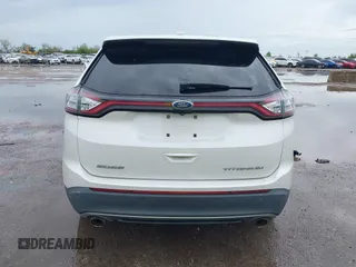 2015 Ford Edge Titanium z VIN 2FMTK3K82FBC42299, wystawiony jako IAAI lot #41912657 z przebiegiem 198 144 mil mil oraz . Historia ofert i sprzedaży dostępna na DreamBid. Obrazek 16.
