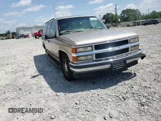 1999 Chevrolet Suburban with VIN 3GNEC16R6XG205408, listed as a Copart auction lot 57169415 with 303,412 mi miles and Salvage title. Bid and sale history available at DreamBid. Image 14.