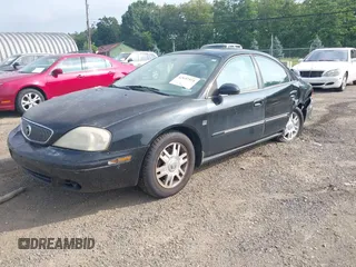 2004 Mercury Sable LS Premium with VIN 1MEFM55S54G615371, listed as a IAAI auction lot 42697921 with 98,607 mi miles and . Bid and sale history available at DreamBid. Image 2.