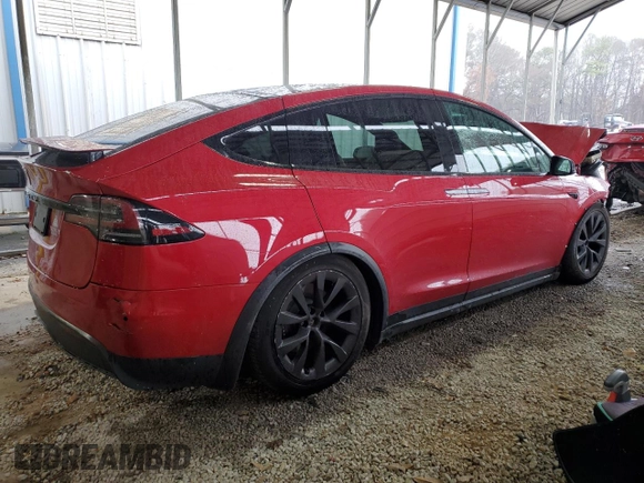 2023 Tesla Model X with VIN 7SAXCBE52PF365140, listed as a Copart auction lot 44564965 with 27,107 mi miles and Salvage Title. Bid and sale history available at DreamBid. Image 3.