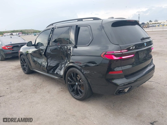 2024 BMW X7 xDrive40i with VIN 5UX23EM01R9V59412, listed as a IAAI auction lot 41890300 with 11,867 mi miles. Bid and sale history available at carsss.com. Image 3.