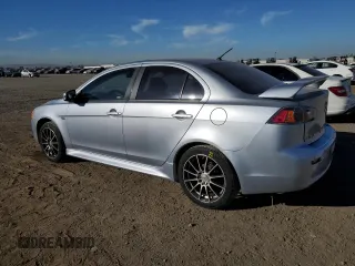 2015 Mitsubishi Lancer ES with VIN JA32U2FU4FU021260, listed as a Copart auction lot 77233514 with 99,548 mi miles and Salvage Title. Bid and sale history available at carsss.com. Image 2.
