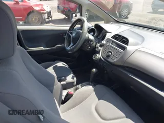 2013 Honda Fit with VIN JHMGE8H38DC047079, listed as a IAAI auction lot 42037073 with 32,794 mi miles. Bid and sale history available at carsss.com. Image 5.