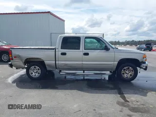 2005 GMC Sierra 1500 SLT z VIN 2GTEK13T351363383, wystawiony jako IAAI lot #41703776 z przebiegiem 142 722 mil mil oraz . Historia ofert i sprzedaży dostępna na DreamBid. Obrazek 13.