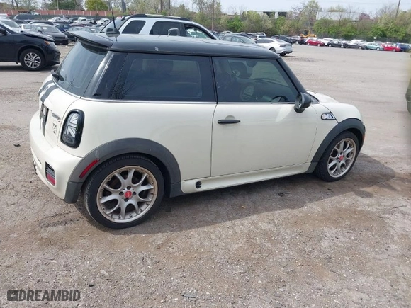 2008 MINI Cooper Hardtop S with VIN WMWMF73578TV33406, listed as a IAAI auction lot 42081596 with 120,183 mi miles. Bid and sale history available at carsss.com. Image 4.