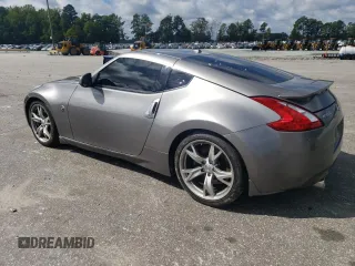2010 Nissan 370Z Touring with VIN JN1AZ4EH8AM501134, listed as a Copart auction lot 73919614 with 106,599 mi miles and Salvage Title. Bid and sale history available at carsss.com. Image 2.