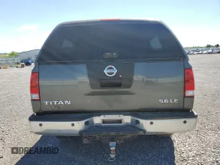 2005 Nissan Titan LE with VIN 1N6BA07B95N571880, listed as a Copart auction lot 57527435 with 199,577 mi miles and Salvage title. Bid and sale history available at DreamBid. Image 6.