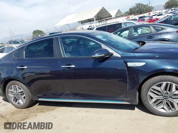 2020 Kia Optima Hybrid EX with VIN KNAGU4LE3L5037713, listed as a IAAI auction lot 42011066 with 93,335 mi miles. Bid and sale history available at carsss.com. Image 13.