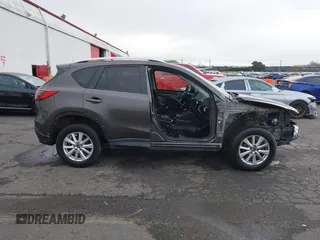 2016 Mazda CX-5 Touring with VIN JM3KE4CY5G0695242, listed as a IAAI auction lot 41795135 with 195,162 mi miles. Bid and sale history available at carsss.com. Image 12.