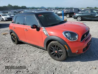 2012 MINI Countryman S with VIN WMWZC3C50CWL82827, listed as a Copart auction lot 57154755 with 149,751 mi miles and Salvage title. Bid and sale history available at DreamBid. Image 4.