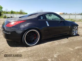 2005 Nissan 350Z Enthusiast z VIN JN1AZ34DX5M607390, wystawiony jako Copart lot #57277905 z przebiegiem 97 629 mil mil oraz Tytuł czysty. Historia ofert i sprzedaży dostępna na DreamBid. Obrazek 3.