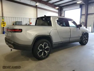 2022 Rivian R1T Adventure Package with VIN 7FCTGAAA4NN014462, listed as a Copart auction lot 73310644 with 89 mi miles and Salvage Title. Bid and sale history available at carsss.com. Image 3.