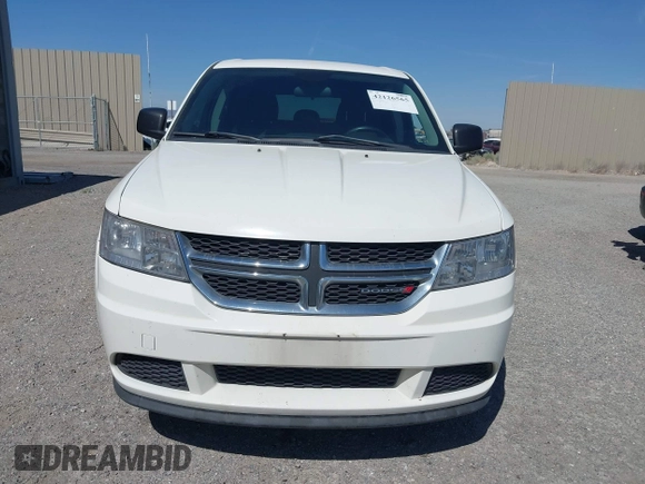 2014 Dodge Journey SE with VIN 3C4PDCAB4ET193896, listed as a IAAI auction lot 42126565 with 242,108 mi miles and . Bid and sale history available at carsss.com. Image 6.