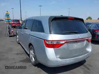 2012 Honda Odyssey Touring с VIN 5FNRL5H91CB004546, выставлен на аукционе IAAI как лот 42175002 с пробегом 118 719 миль миль и . История ставок и продаж доступна на DreamBid. Изображение 3.