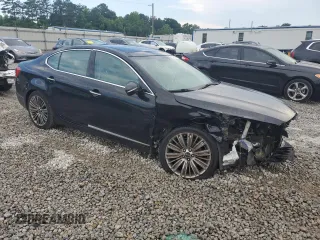 2014 Kia Cadenza Premium z VIN KNALN4D74E5142310, wystawiony jako Copart lot #56832925 z przebiegiem 255 812 mil mil oraz Szkoda całkowita • Salvage title. Historia ofert i sprzedaży dostępna na DreamBid. Obrazek 4.