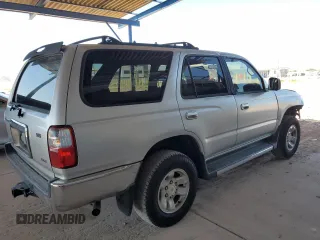 2002 Toyota 4Runner SR5 z VIN JT3GN86R520247946, wystawiony jako Copart lot #53468065 z przebiegiem 216 120 mil mil oraz Szkoda całkowita • Salvage title. Historia ofert i sprzedaży dostępna na DreamBid. Obrazek 3.