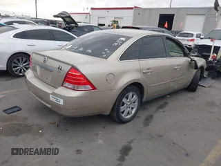 2005 Mercury Montego Luxury z VIN 1MEFM40185G611793, wystawiony jako IAAI lot #41125667 z przebiegiem Nie podano mil oraz . Historia ofert i sprzedaży dostępna na DreamBid. Obrazek 4.