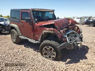 2010 Jeep Wrangler Rubicon with VIN 1J4BA6D14AL167077, listed as a Copart auction lot 54233795 with 148,638 mi miles and Salvage title. Bid and sale history available at DreamBid. Image 4.