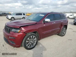 2017 Jeep Grand Cherokee Overland with VIN 1C4RJECG3HC868255, listed as a Copart auction lot 83041054 with 121,604 mi miles and Salvage Title. Bid and sale history available at carsss.com. Image 1.