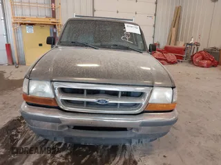 1998 Ford Ranger XL z VIN 1FTYR10CXWUC58486, wystawiony jako IAAI lot #42507768 z przebiegiem 214 343 mil mil oraz . Historia ofert i sprzedaży dostępna na DreamBid. Obrazek 6.