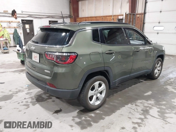 2021 Jeep Compass Latitude with VIN 3C4NJDBB1MT566220, listed as a IAAI auction lot 41816107 with 69,139 mi miles and . Bid and sale history available at DreamBid. Image 4.