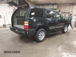 2004 Chevrolet Tahoe Z71 with VIN 1GNEK13T64R100267, listed as a IAAI auction lot 41544388 with 212,525 mi miles and . Bid and sale history available at DreamBid. Image 4.