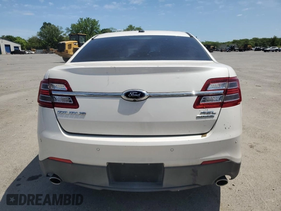 2015 Ford Taurus SEL z VIN 1FAHP2E82FG108442, wystawiony jako Copart lot #57790515 z przebiegiem 116 834 mil mil oraz Szkoda całkowita • Salvage title. Historia ofert i sprzedaży dostępna na DreamBid. Obrazek 6.