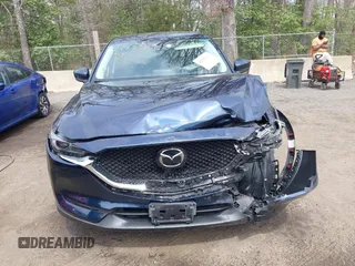 2018 Mazda CX-5 Grand Touring with VIN JM3KFBDM3J0377866, listed as a IAAI auction lot 41947014 with 70,446 mi miles. Bid and sale history available at carsss.com. Image 12.