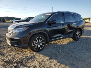 2022 Honda Pilot Touring 7-Passenger z VIN 5FNYF5H61NB029832, wystawiony jako Copart lot #82173774 z przebiegiem 45 173 mil mil oraz Szkoda całkowita • Salvage title. Historia ofert i sprzedaży dostępna na DreamBid. Obrazek 1.