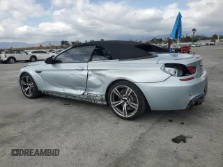 2014 BMW M6 z VIN WBSLZ9C50EDZ78344, wystawiony jako Copart lot #54719265 z przebiegiem 59 556 mil mil oraz Szkoda całkowita • Salvage title. Historia ofert i sprzedaży dostępna na DreamBid. Obrazek 2.