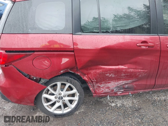2015 Mazda 5 Touring with VIN JM1CW2CL0F0188959, listed as a IAAI auction lot 41702425 with 104,952 mi miles. Bid and sale history available at carsss.com. Image 6.