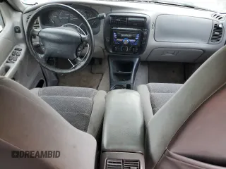 1998 Ford Explorer XLT with VIN 1FMZU32P0WUD21265, listed as a Copart auction lot 73702364 with 211,096 mi miles and Salvage title. Bid and sale history available at DreamBid. Image 8.