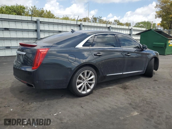 2013 Cadillac XTS Luxury with VIN 2G61R5S34D9101006, listed as a Copart auction lot 51241485 with 143,522 mi miles and Clean Title. Bid and sale history available at DreamBid. Image 3.