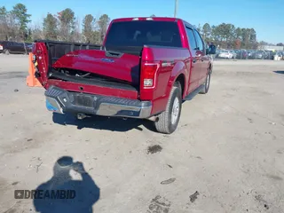 2015 Ford F-150 XLT with VIN 1FTEW1EP3FKF13367, listed as a IAAI auction lot 40994830 with 70,728 mi miles. Bid and sale history available at carsss.com. Image 4.