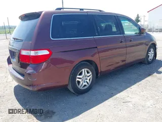 2007 Honda Odyssey EX-L with VIN 5FNRL38717B455291, listed as a IAAI auction lot 42253070 with 222,016 mi miles and . Bid and sale history available at DreamBid. Image 4.